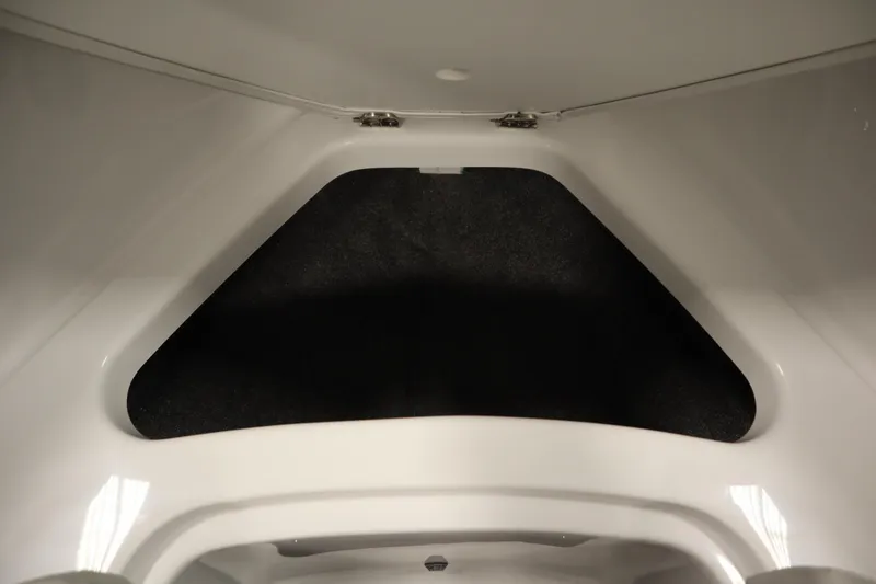 Slide: The Image of Interior of Four Winns H1 boat 2026, white and black design. - 11