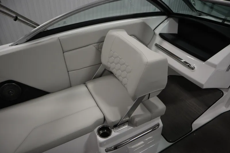 Slide: The Image of 2026 Four Winns H1 boat interior with sleek, modern seating and cup holder. - 28