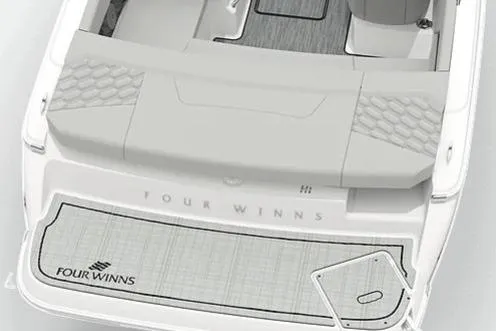 Slide: The Image of 2026 Four Winns H1 Freedom boat, rear view with seating and deck details. - 46