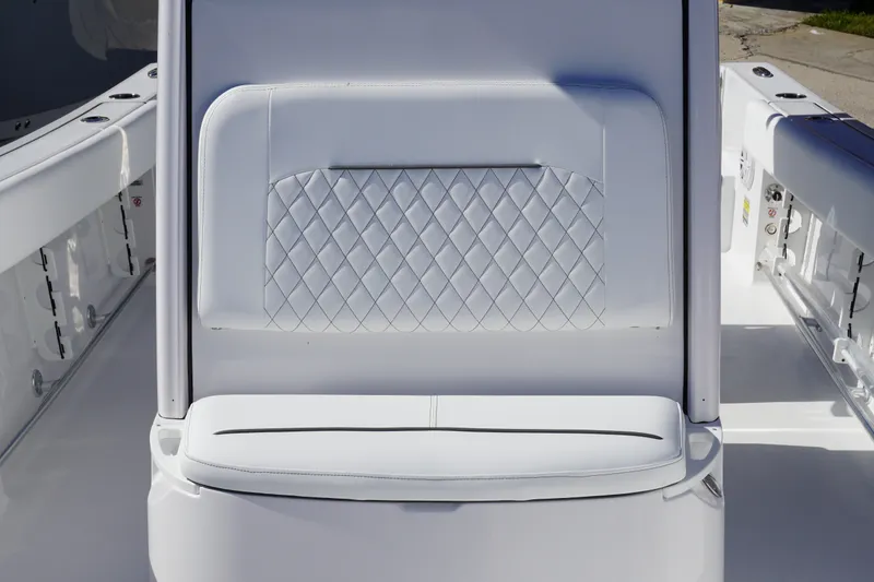 Slide: The Image of 2027 Sportsman Open 232 Center Console boat seat with diamond-pattern upholstery. - 20