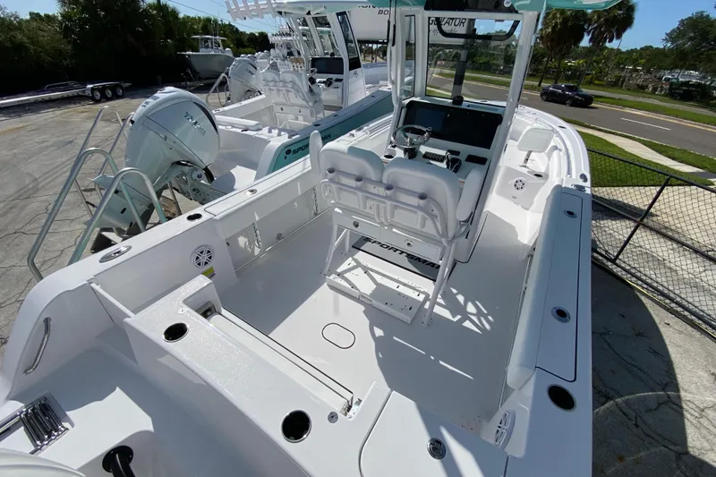 Slide: The Image of 2027 Sportsman Open 232 Center Console boat with sleek design and modern features. - 2