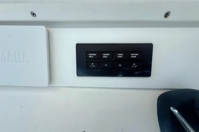 Slide: The Image of Control panel on a 2007 Regulator 29 Forward Seating boat with Yamaha branding. - 16