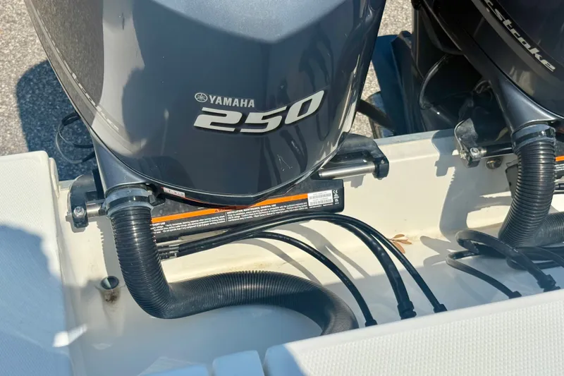 Slide: The Image of Yamaha 250 outboard engines on a 2007 Regulator 29 Forward Seating boat. - 25