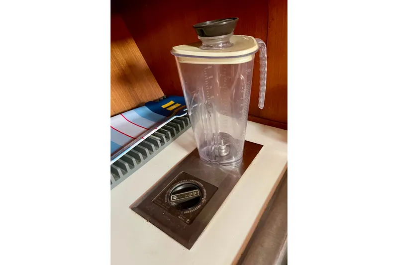 Slide: The Image of Blender pitcher on CHB 42 yacht counter, 1985 model, with nautical decor. - 44