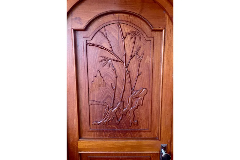 Slide: The Image of Wooden door with bamboo carving, CHB 42 model, 1985 design. - 47