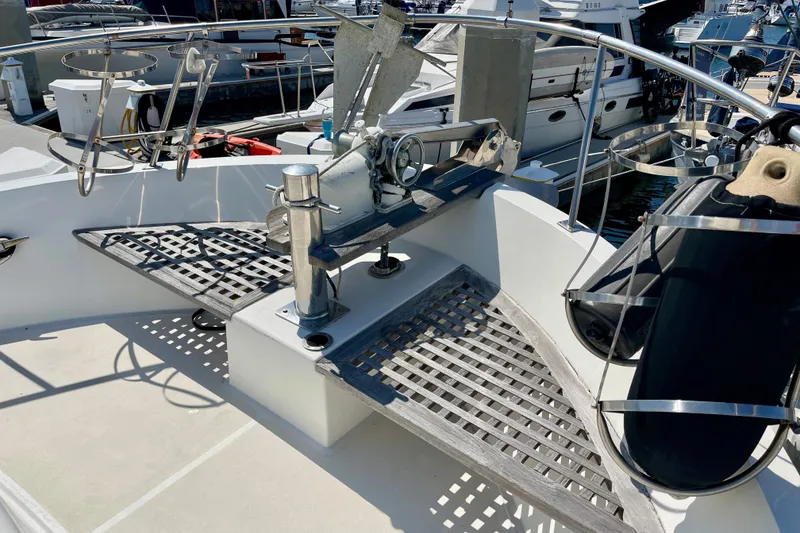 Slide: The Image of Deck of 1985 CHB 42 yacht with anchor and railing, docked at marina. - 3