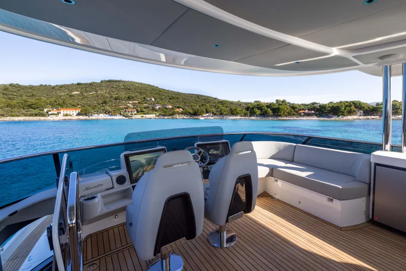 Slide: The Image of Luxurious 2026 Absolute Navetta Co Ownership yacht interior with scenic ocean view. - 32