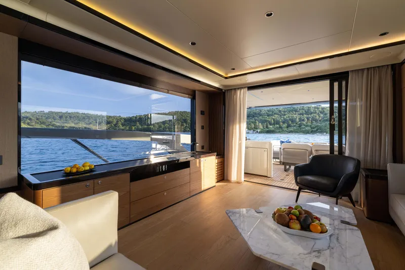 Slide: The Image of Luxurious interior of 2026 Absolute Navetta Co Ownership yacht with scenic water view. - 45