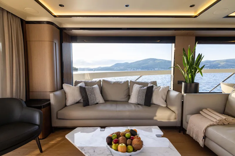 Slide: The Image of Luxurious interior of 2026 Absolute Navetta Co Ownership yacht with scenic ocean view. - 41