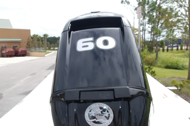 Slide: The Image of Outboard motor on a 2027 Mako Pro Skiff 15 CC, featuring a 60 horsepower engine. - 4