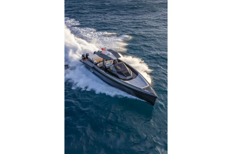 Slide: The Image of A sleek, modern motorboat speeds across the open sea. - 5
