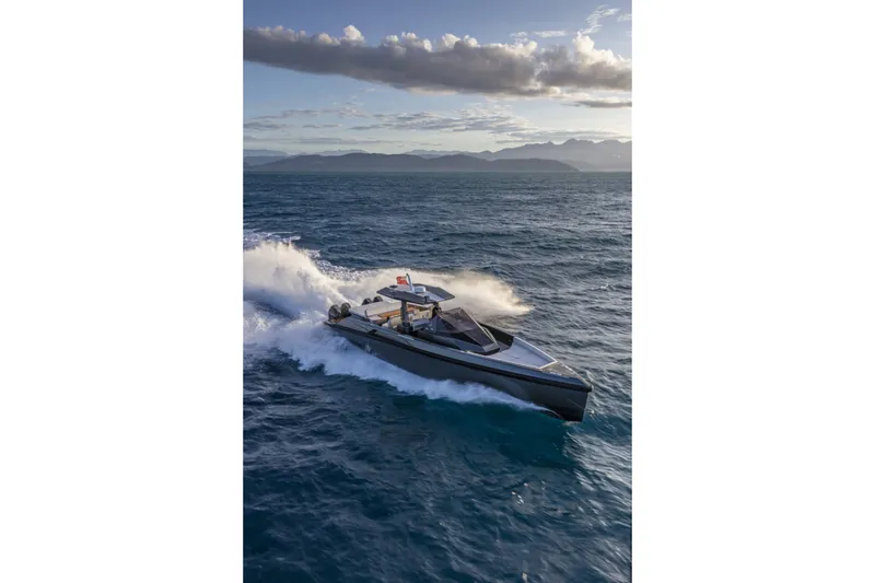 Slide: The Image of 2026 Wally wallytender48X yacht cruising on open sea under cloudy sky. - 6