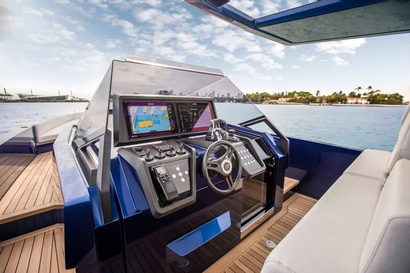 Slide: The Image of Modern helm of 2026 Wally wallytender48X yacht with advanced navigation systems. - 11