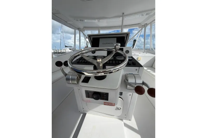 Slide: The Image of Helm of 1998 Luhrs 40 Open boat with Garmin navigation system. - 22