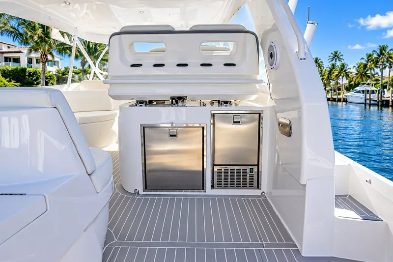 Slide: The Image of Luxurious 2022 Intrepid 477 Evolution yacht interior with sleek design and modern amenities. - 7