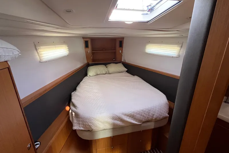 Slide: The Image of Cozy cabin interior of 2013 Bavaria Vision 46 yacht with double bed and skylight. - 29