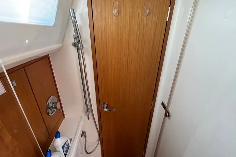 Slide: The Image of Bathroom interior of 2013 Bavaria Vision 46 yacht with shower and wooden door. - 39