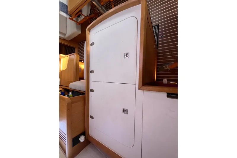 Slide: The Image of Interior of 2013 Bavaria Vision 46 yacht, featuring wooden cabinetry and modern design elements. - 22