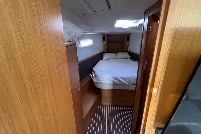 Slide: The Image of Cozy cabin interior of 2013 Bavaria Vision 46 yacht with wooden furnishings. - 28