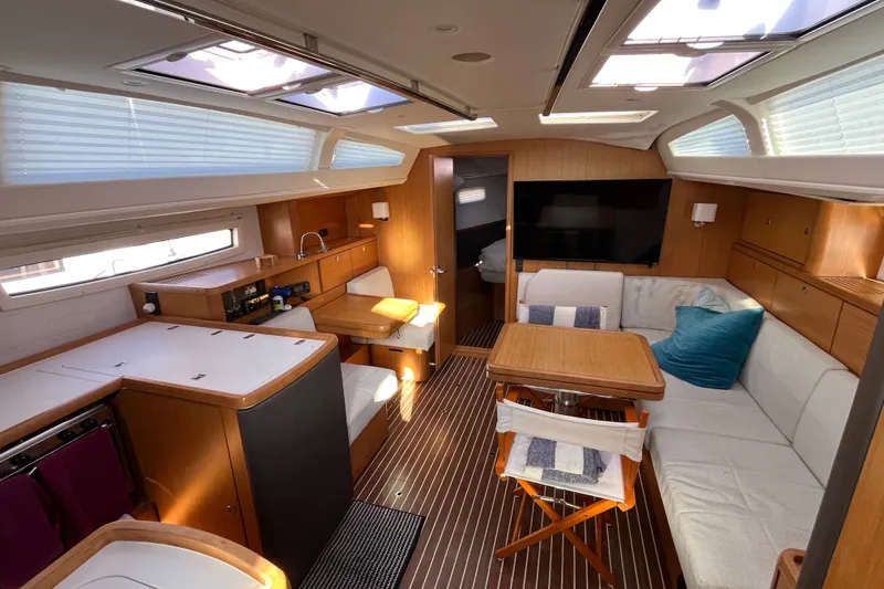 Slide: The Image of Luxurious interior of 2013 Bavaria Vision 46 yacht with modern furnishings and ample natural light. - 16