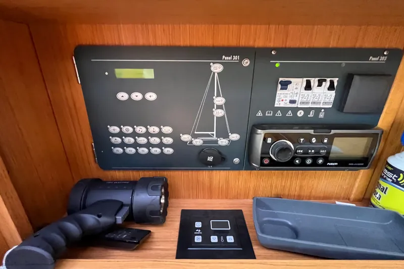 Slide: The Image of Control panel of a 2013 Bavaria Vision 46 yacht with navigation and communication equipment. - 42