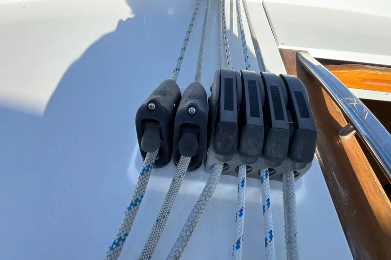Slide: The Image of Close-up of rope clutches on a 2013 Bavaria Vision 46 sailboat deck. - 12