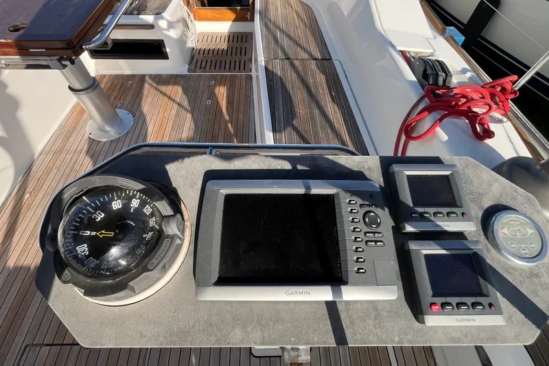 Slide: The Image of Cockpit of 2013 Bavaria Vision 46 yacht with navigation instruments and compass. - 13