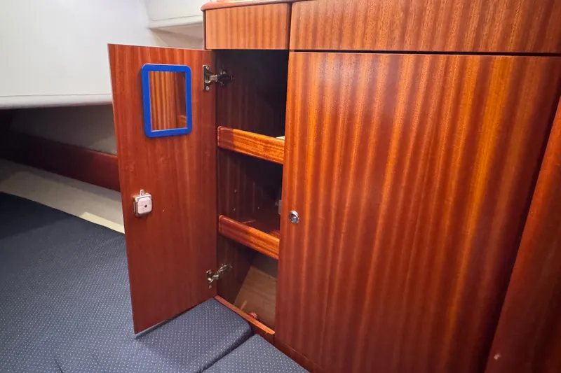 Slide: The Image of Wooden cabinet interior on a 2003 Bavaria Cruiser 44 yacht. - 29