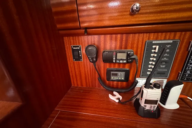 Slide: The Image of Control panel of a 2003 Bavaria Cruiser 44 yacht with communication equipment. - 23
