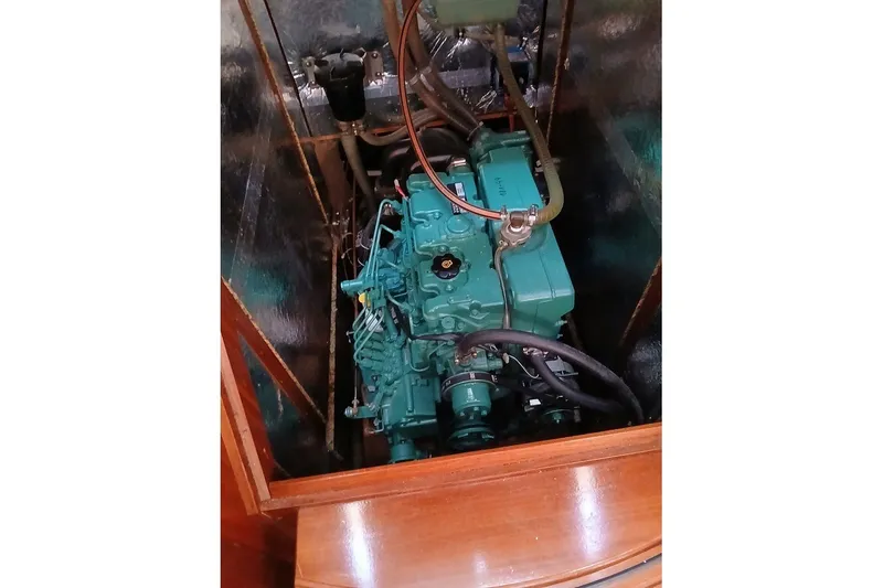 Slide: The Image of Engine compartment of a 2003 Bavaria Cruiser 44 sailboat, showcasing its marine engine. - 35