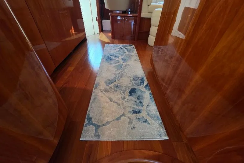 Slide: The Image of Luxurious Neptunus Flybridge MY 2008 interior with elegant wooden flooring and stylish rug. - 59