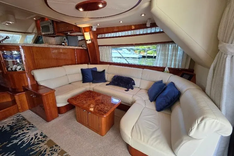 Slide: The Image of Luxurious 2008 Neptunus Flybridge MY yacht interior with elegant seating and wooden accents. - 83