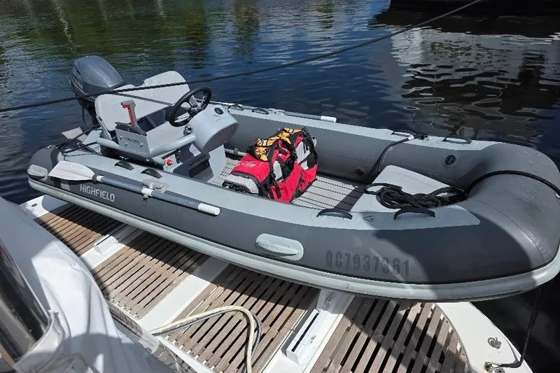 Slide: The Image of Gray inflatable boat docked on a Neptunus Flybridge MY, 2008 model. - 14