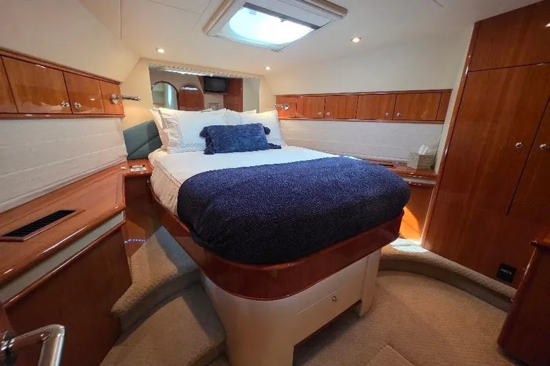 Slide: The Image of Luxurious bedroom interior of 2008 Neptunus Flybridge MY yacht with elegant wood finishes. - 121