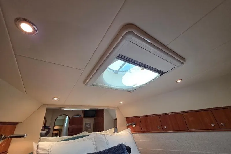 Slide: The Image of Interior of 2008 Neptunus Flybridge MY yacht with skylight and wooden cabinetry. - 128