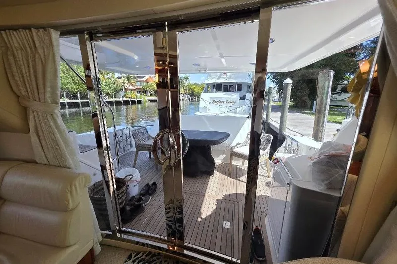 Slide: The Image of Interior view of 2008 Neptunus Flybridge MY yacht, showcasing deck and marina. - 49