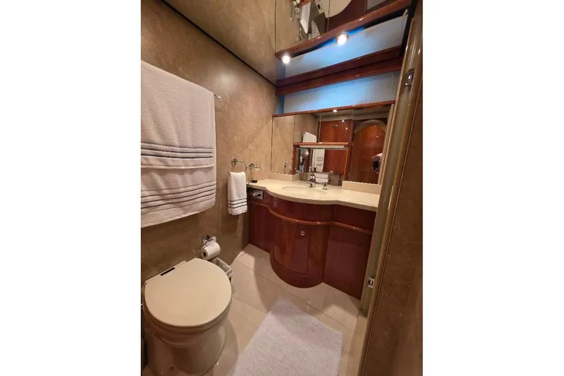 Slide: The Image of Luxurious bathroom in 2008 Neptunus Flybridge MY yacht with elegant wood cabinetry. - 143