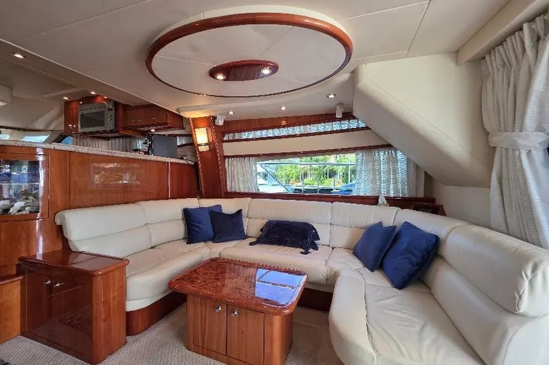 Slide: The Image of Luxurious interior of 2008 Neptunus Flybridge MY yacht with plush seating and elegant wood finishes. - 79