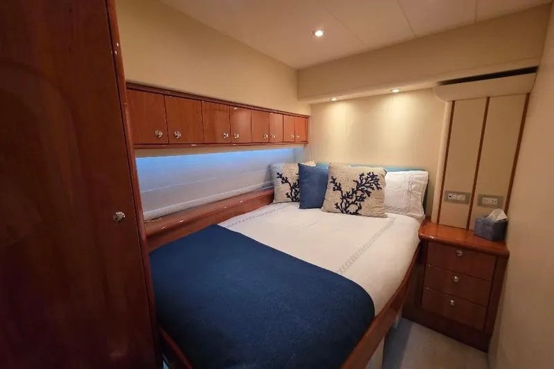 Slide: The Image of Luxurious cabin interior of 2008 Neptunus Flybridge MY yacht with elegant bedding. - 140