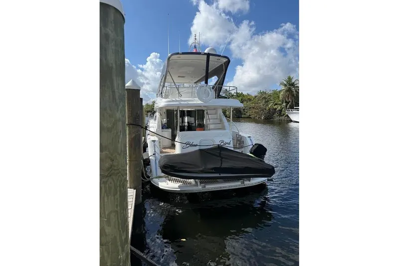 Slide: The Image of 2008 Neptunus Flybridge MY yacht docked by a scenic waterway. - 9