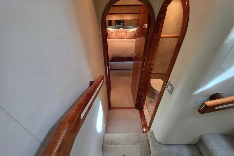 Slide: The Image of Luxurious interior of 2008 Neptunus Flybridge MY yacht, featuring elegant wood finishes. - 114