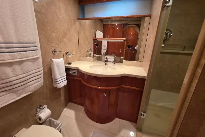 Slide: The Image of Luxurious bathroom in 2008 Neptunus Flybridge MY yacht with elegant wood cabinetry. - 144