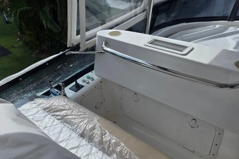 Slide: The Image of Interior view of 2008 Neptunus Flybridge MY yacht with control panel and seating area. - 32