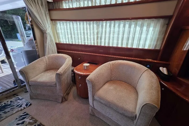 Slide: The Image of Luxurious 2008 Neptunus Flybridge MY interior with plush seating and elegant decor. - 80