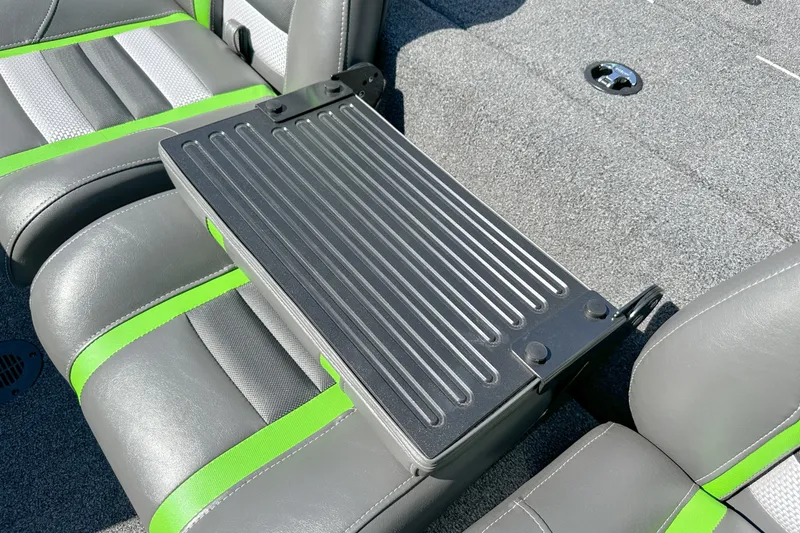 Slide: The Image of 2019 Ranger RT178 boat interior with gray and green seats and a foldable center console. - 11