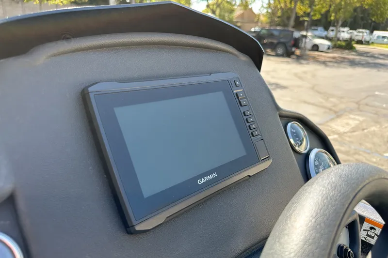 Slide: The Image of Garmin GPS device on 2019 Ranger RT178 dashboard, with gauges visible in sunlight. - 7