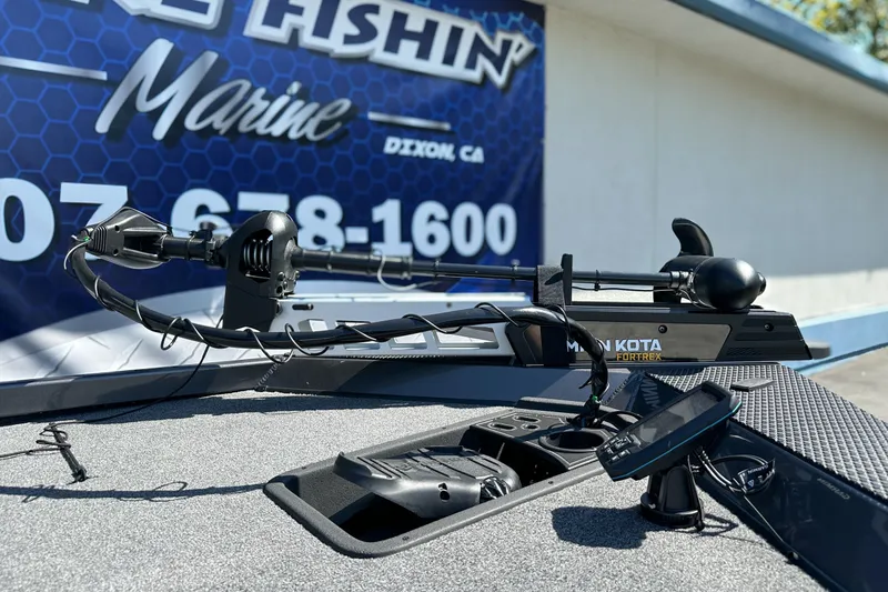 Slide: The Image of 2019 Ranger RT178 boat with Minn Kota Fortrex trolling motor at a marine shop. - 1