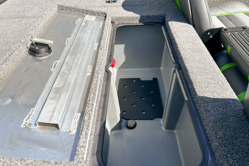 Slide: The Image of 2019 Ranger RT178 boat storage compartment with carpeted interior and seating. - 13