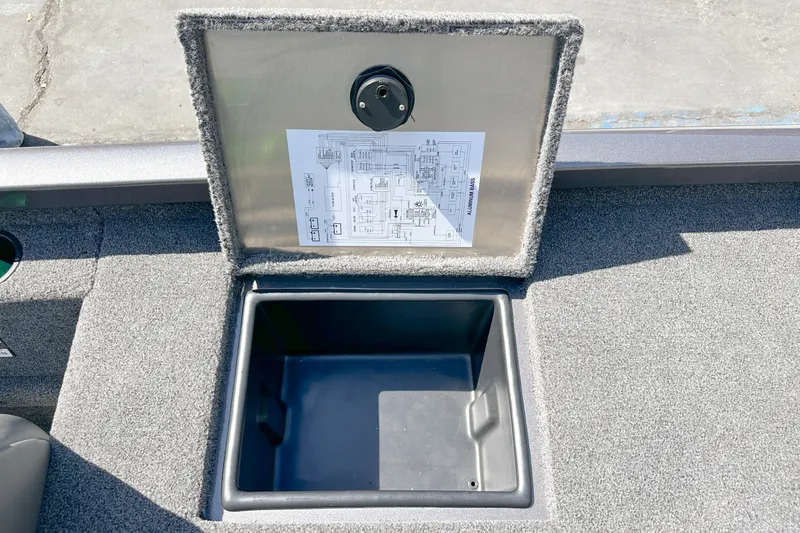 Slide: The Image of 2019 Ranger RT178 boat storage compartment with open lid and schematic diagram. - 14