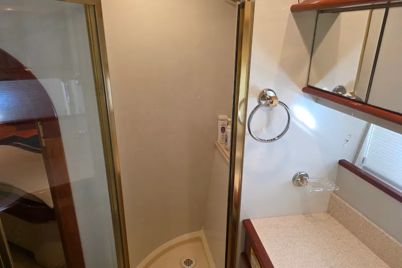 Slide: The Image of Bathroom interior of 2002 Neptunus 56 Flybridge yacht with shower and vanity. - 70